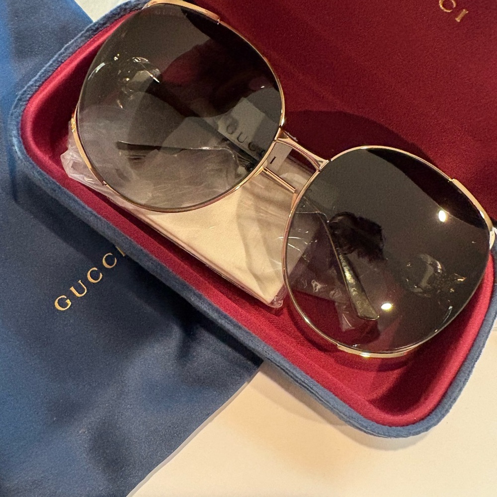 Authentic GUCCI (GG0225S) Gold & Black